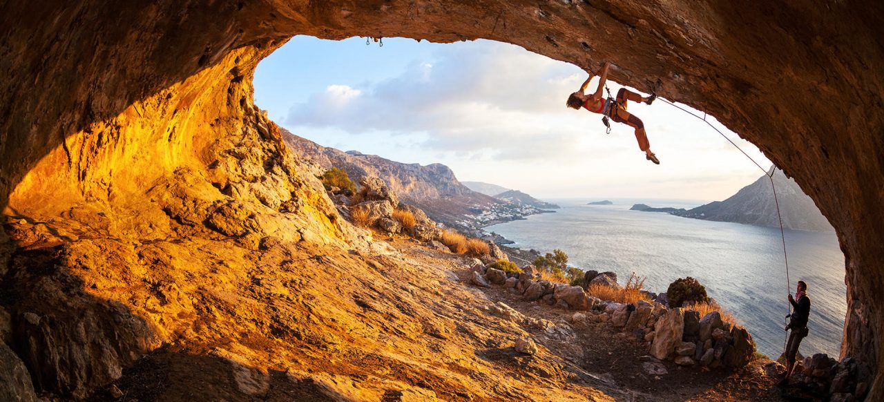 climber hanging sideways