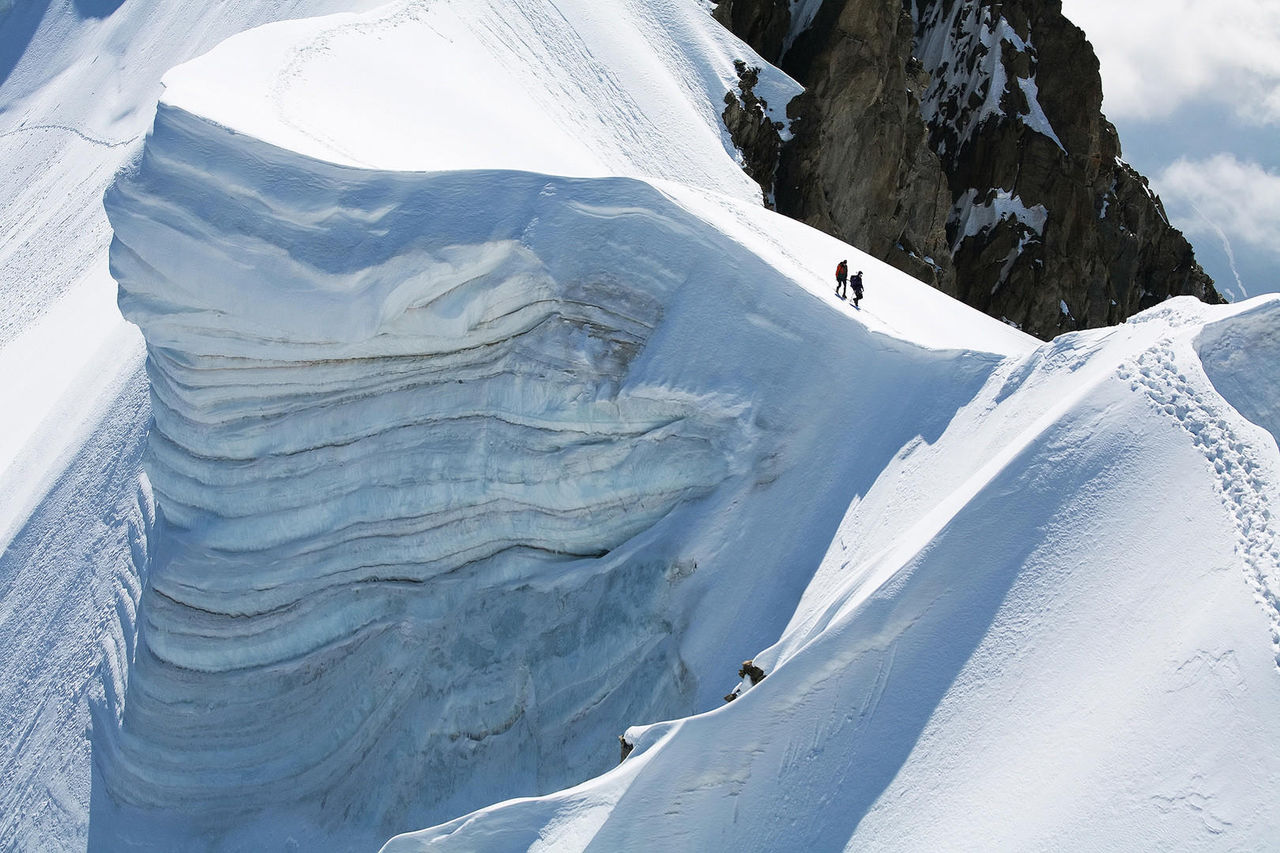 Team of two alpinists on Rochefort Ridge, France